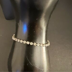 Good, preowned vintage condition bracelet silver time with clear rhinestones